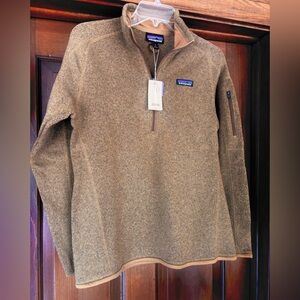 Women’s   Patagonia Brown Quarter-Zip Pullover. Color is “Nest Brown”